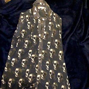 A see through tank top style button down shirt